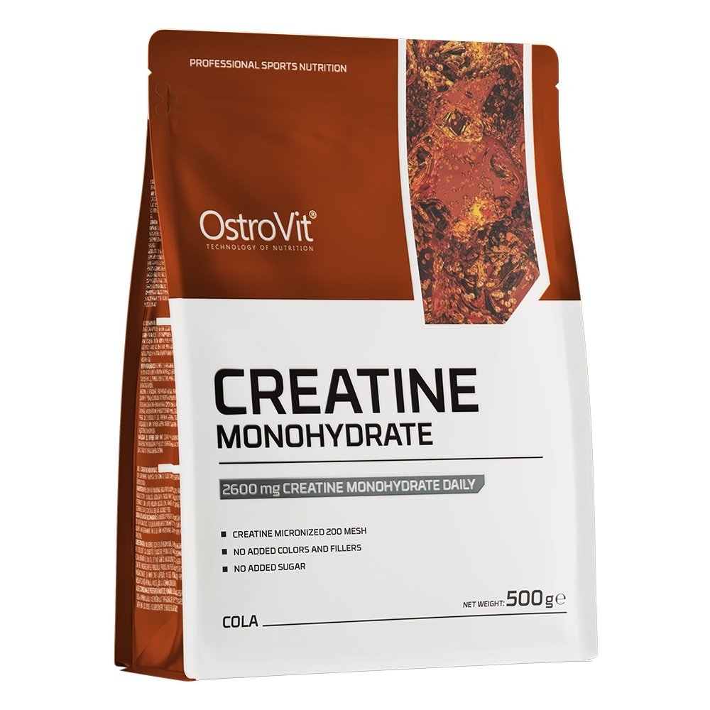 OstroVit Creatine Monohydrate 500g cola-flavour supplement powder in a brown and white resealable pouch, designed for sports nutrition and muscle support.