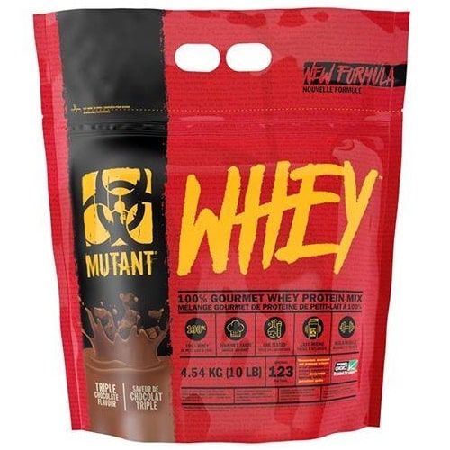 Mutant Whey 4540g protein powder shown as a scoop of fine powder next to the product container