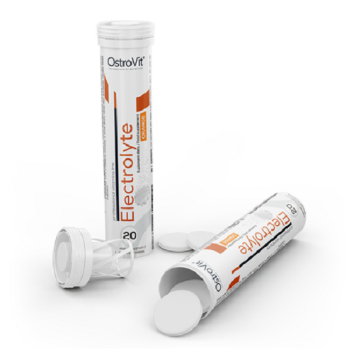 OstroVit Electrolyte 20 effervescent tabs in orange flavour, a dietary supplement for hydration and electrolyte balance, shown in white tubes with orange accents and visible tablets.