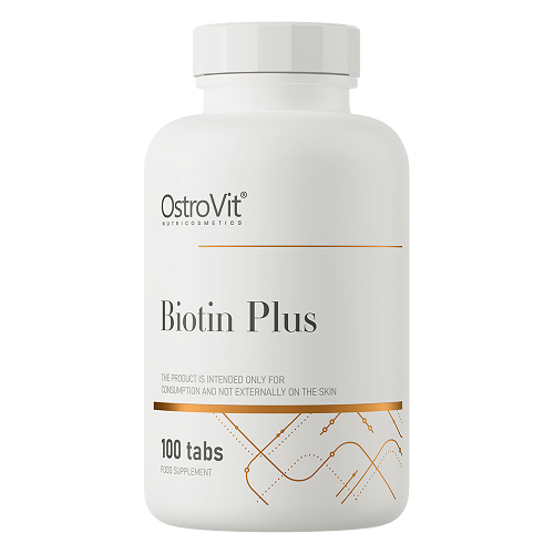 OstroVit Biotin Plus 100 tabs food supplement, white bottle with minimalist gold and black design, contains biotin tablets for dietary supplementation.