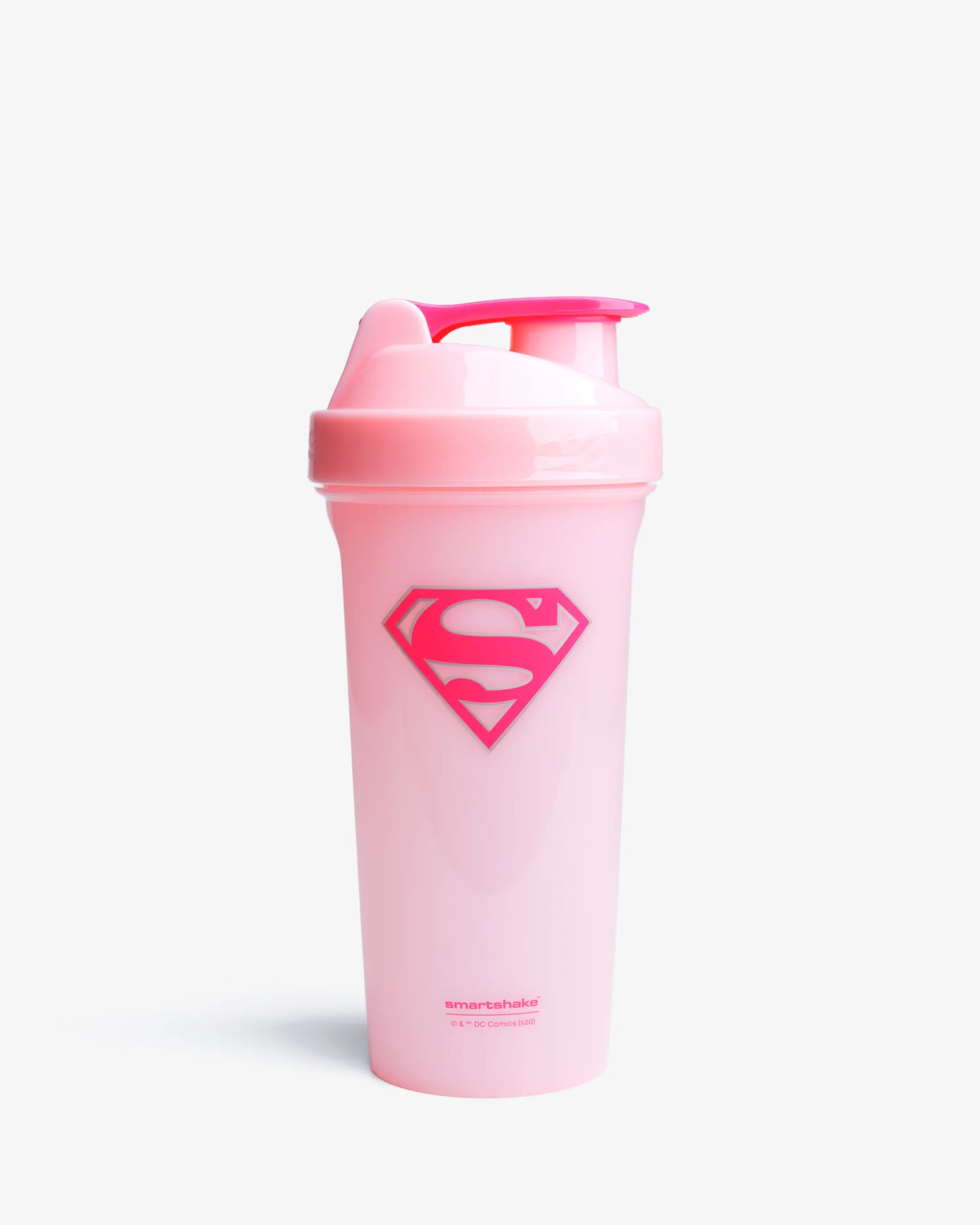 SmartShake Lite DC Comics Supergirl 800ml shaker bottle, light pink with a bold pink Supergirl logo and a matching pink flip cap, ideal for fitness drinks.