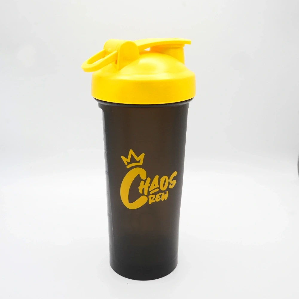 Chaos Crew Shaker 700ml gym bottle featuring a bold yellow lid and graffiti-style Chaos Crew logo on a black BPA-free plastic body, ideal for mixing protein shakes and smoothies.