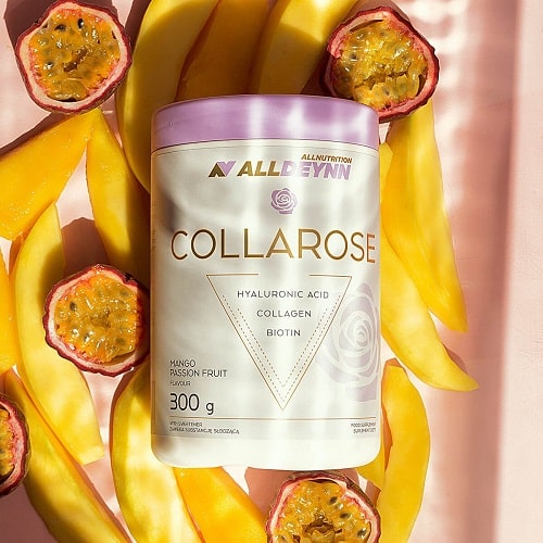 Allnutrition ALLDEYNN Collarose 300g mango passion fruit flavour collagen supplement with hyaluronic acid and biotin, shown in a white and lavender tub surrounded by fresh mango and passion fruit slices.