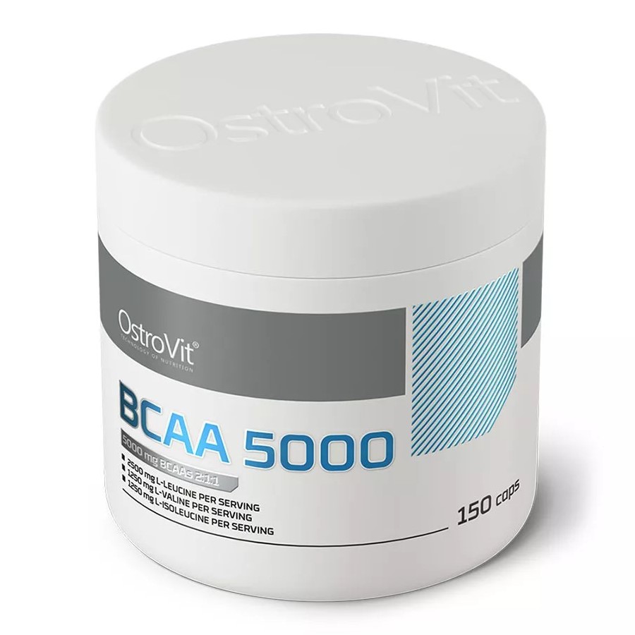 OstroVit BCAA 5000 150 caps, a branched-chain amino acid supplement in capsule form, featuring 5000 mg BCAAs per serving, in a white and grey container.