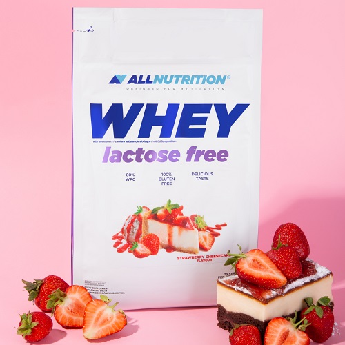 Allnutrition Whey Lactose Free strawberry cheesecake flavour protein powder, 700g bag, lactose free and gluten free, with strawberries and cheesecake on a pink background.