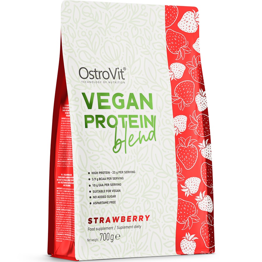OstroVit Vegan Protein Blend 700g strawberry flavour plant-based protein supplement, suitable for vegans, in a red and white pouch with strawberry illustrations.