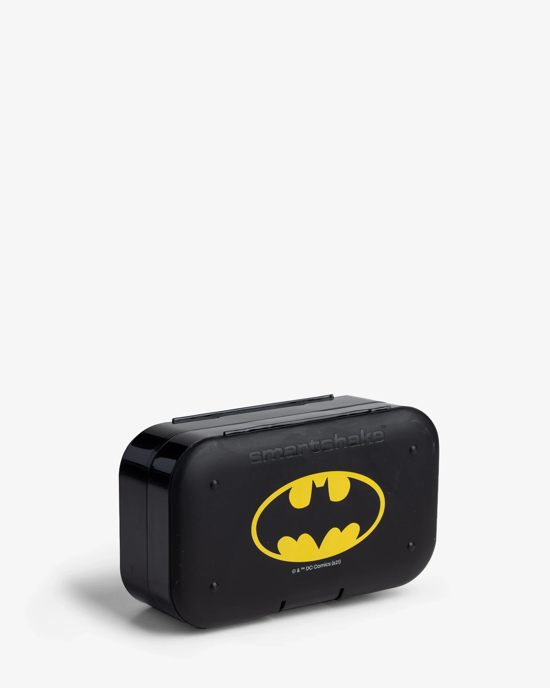 SmartShake Pill Box Organizer DC Batman 2pack, a compact black pill organizer with yellow Batman logo, dual compartments, and secure snap closure.