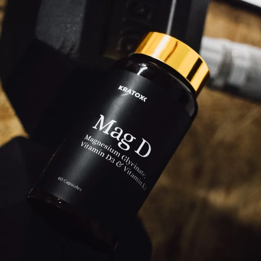 Kratox Mag D magnesium and vitamin D3 capsule supplement, 60 capsules in a black bottle with a gold cap.