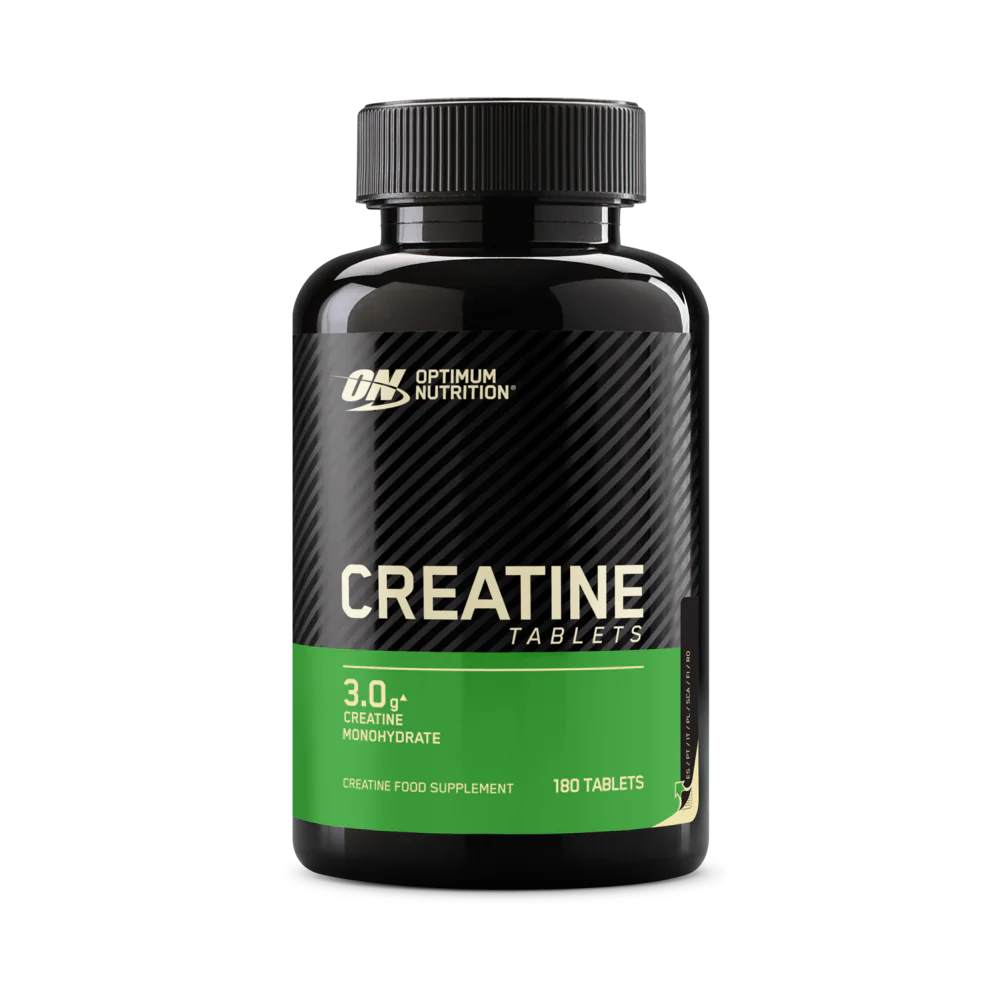 Optimum Nutrition Creatine Tablets, creatine monohydrate supplement, 180 tablets in a black bottle with green label, sports nutrition product.